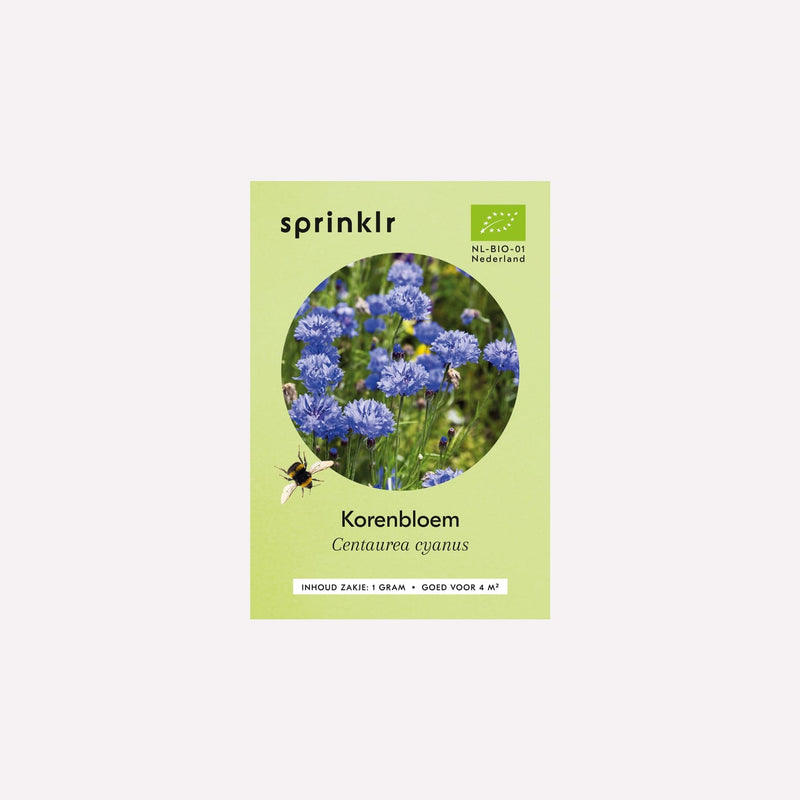 Voorkant zakje biologisch zaad Sprinklr - Korenbloem