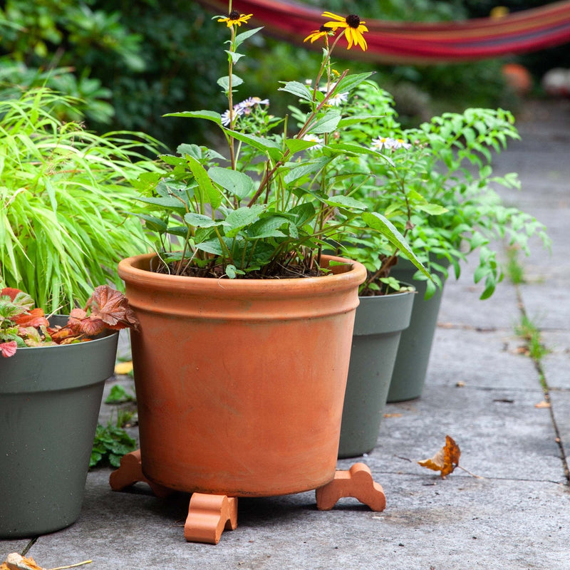 bloempotdrager met pot en planten